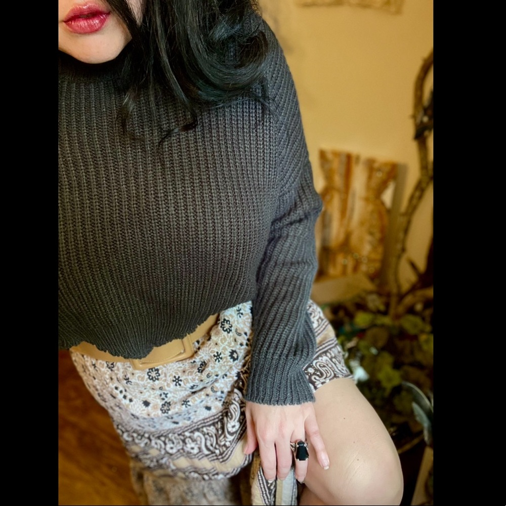 Grey knit Crop Sweater with distressed hem.